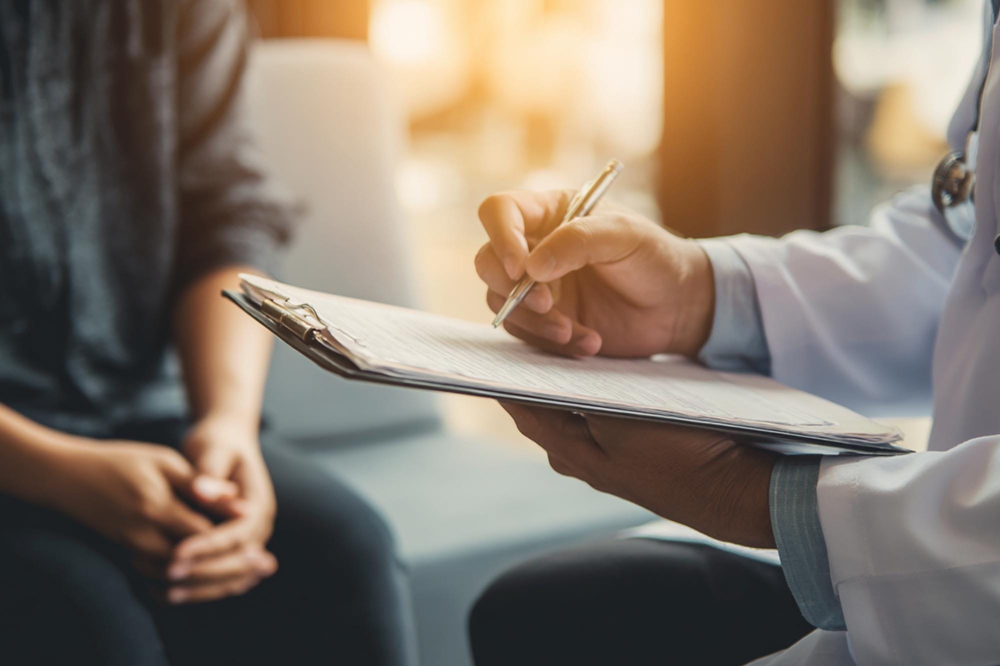 doctor reviewing medication plan with patient, professional setting, soft lighting
